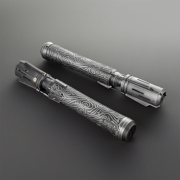 Two metallic saber with intricate patterns on a gray background