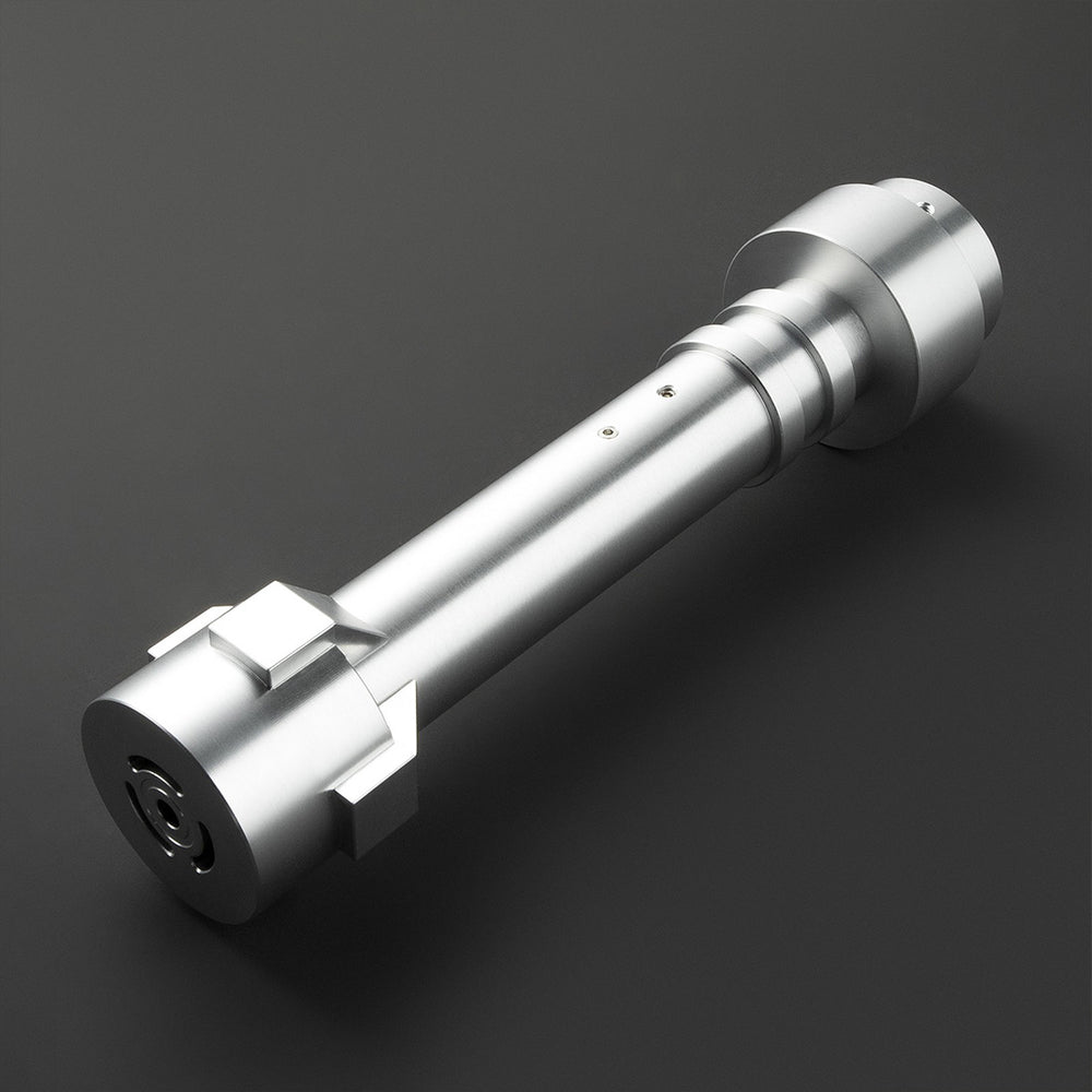 Metallic tool or component on a dark background