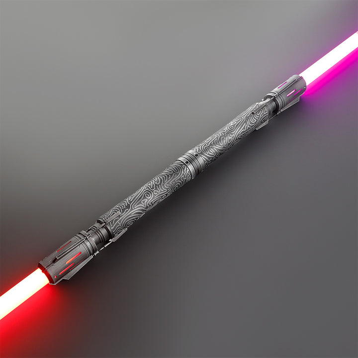 Decorative lightsaber with red and pink blade on a gray background